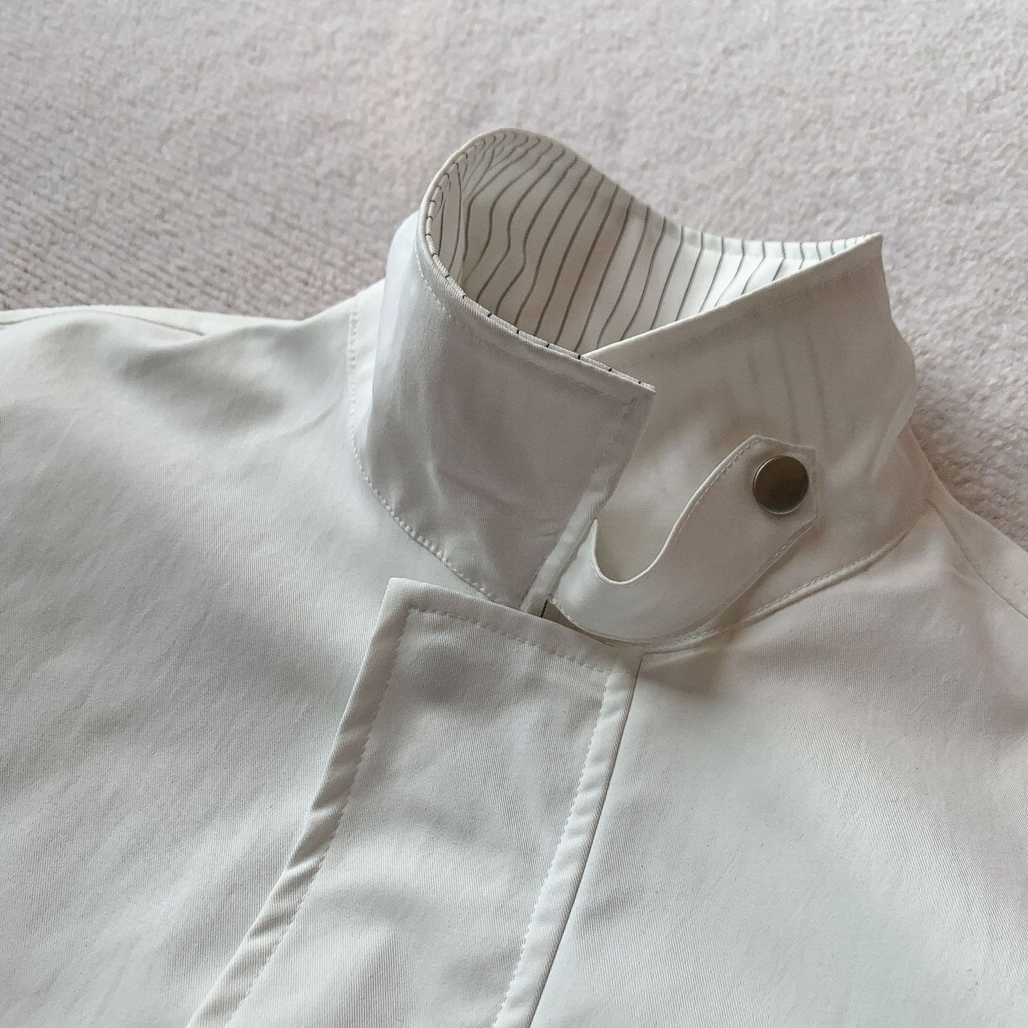Stripe collar bomber hem detail | ZIRR