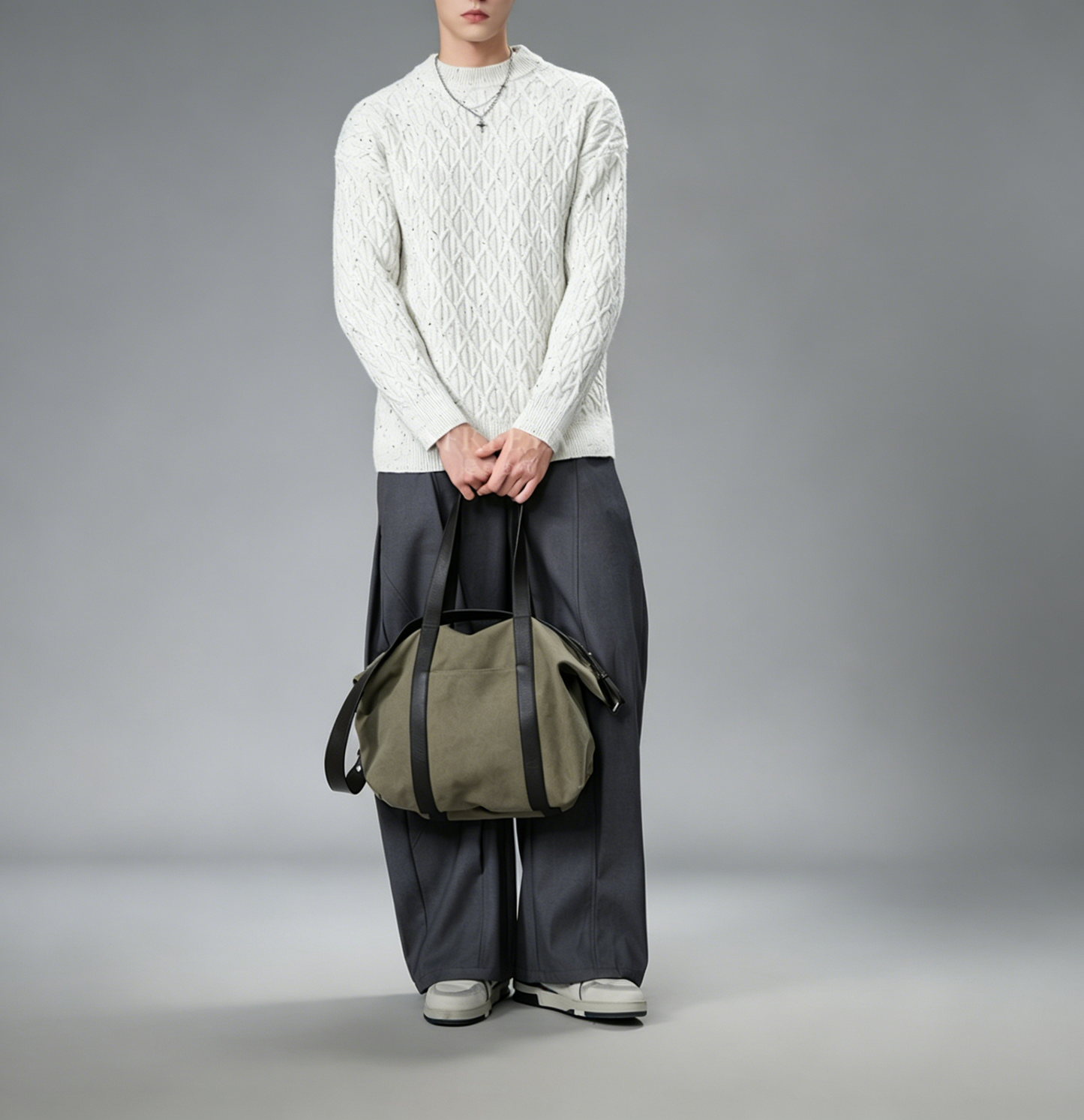 Canvas leather trim duffle leather handle detail | ZIRR