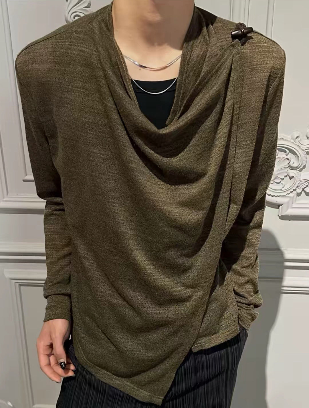 Coffee draped knit top on model