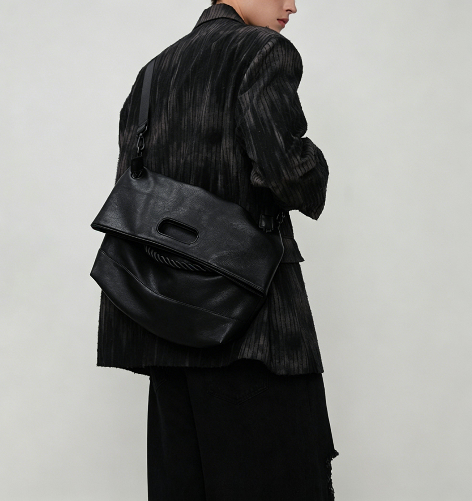 Fold flap rope handle bag back view | ZIRR
