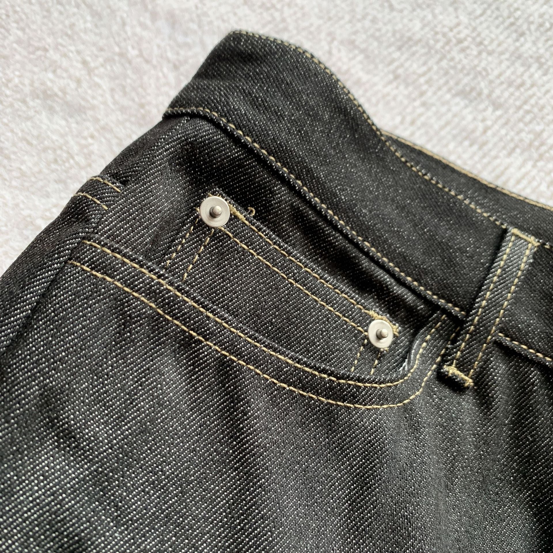 Raw selvedge flare denim waistband detail | ZIRR