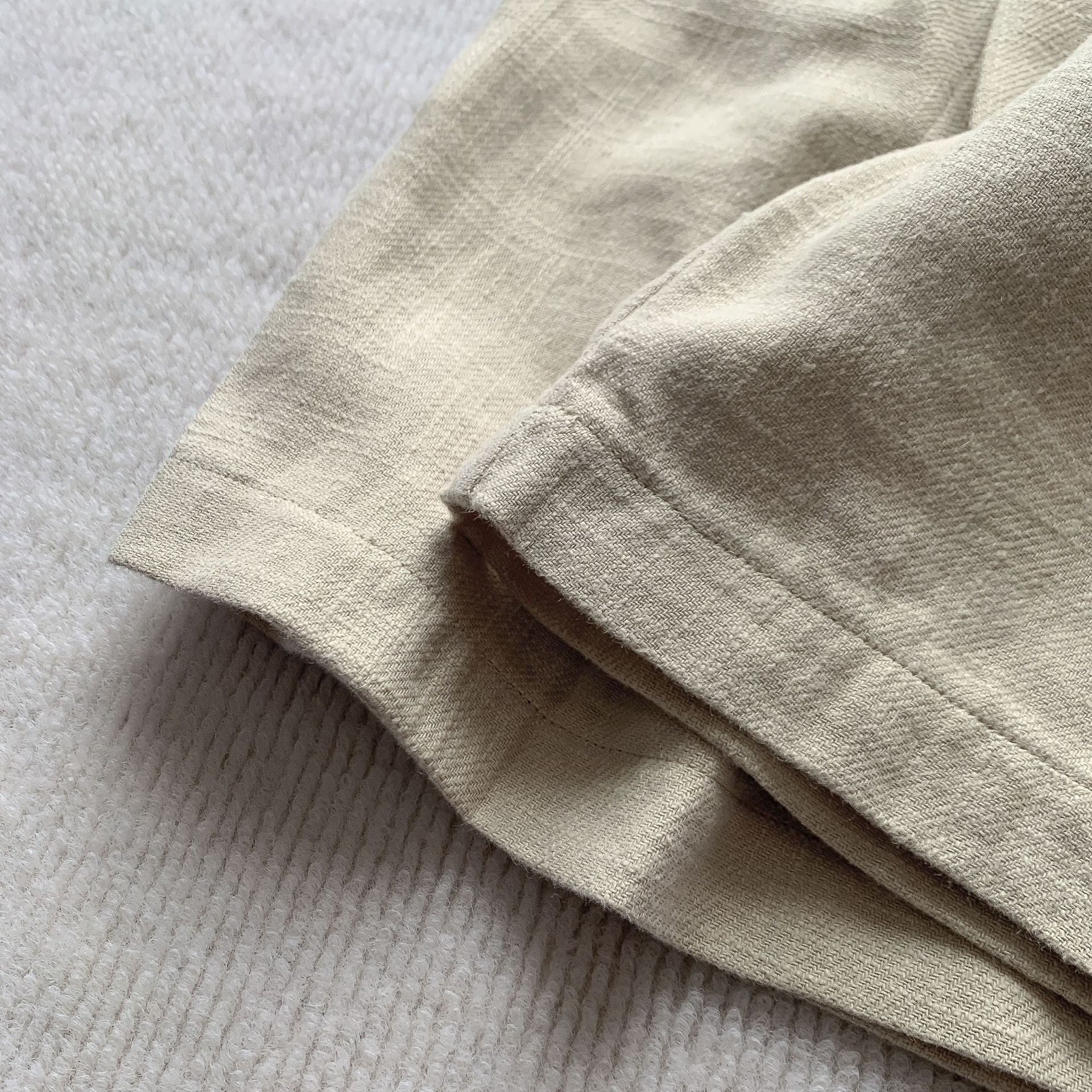 Linen pleat shorts hem detail | ZIRR