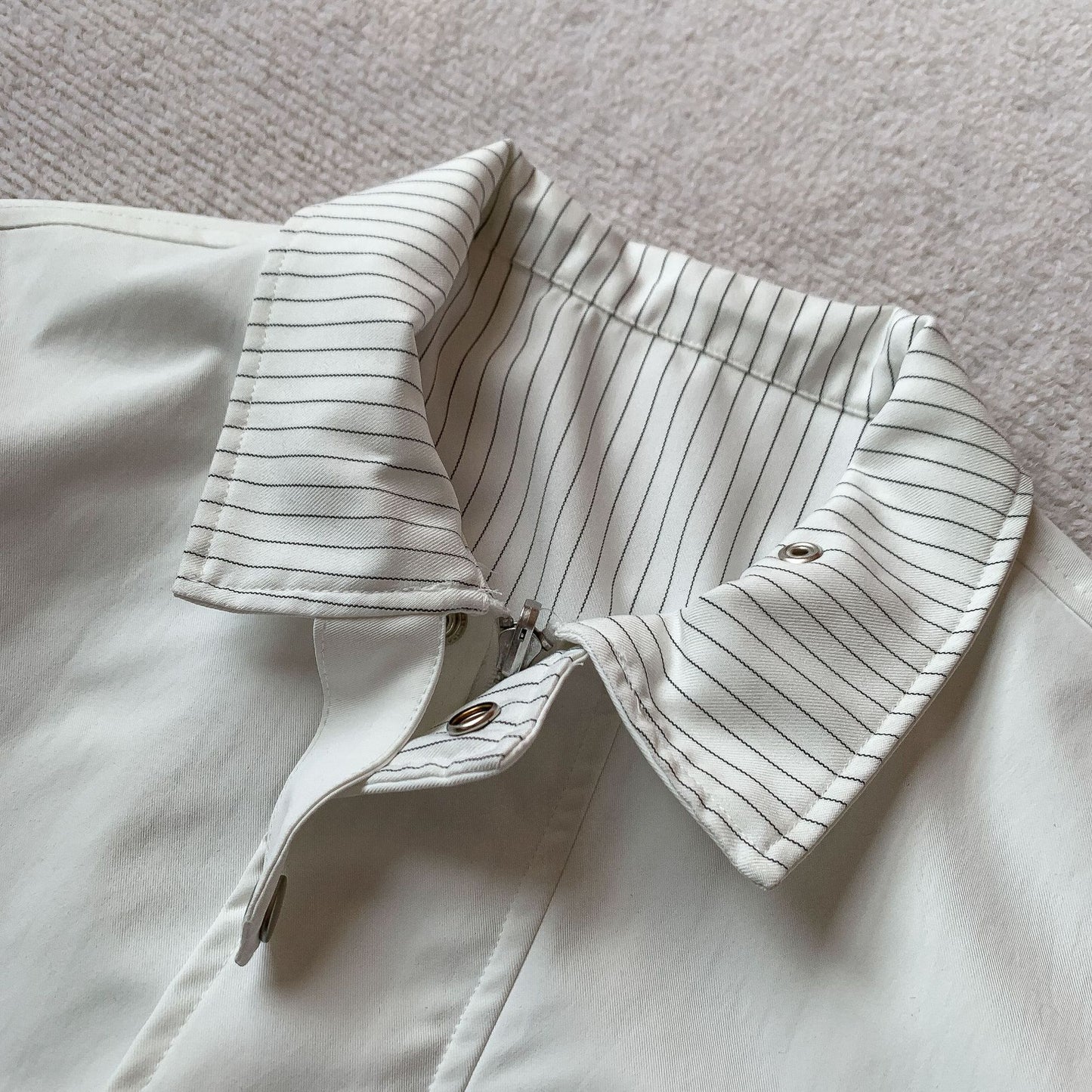 Stripe collar bomber snap button detail | ZIRR